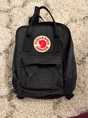 Fjallraven Kanken Mini Backpack in Black with Red Logo
